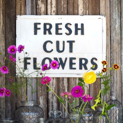 Embossed Metal Flower Sign